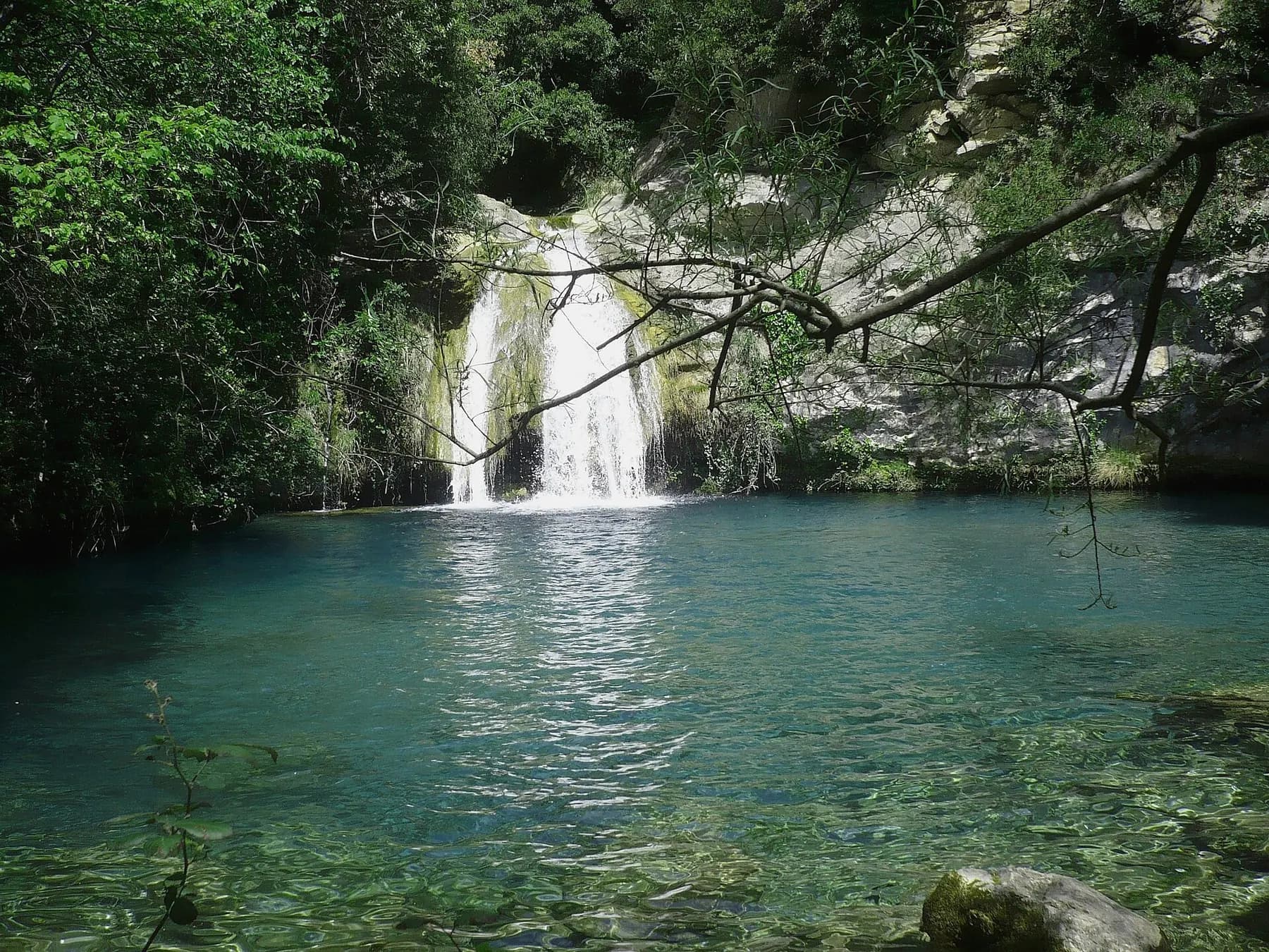 The Gorg Blau, a turquoise pool below a waterfall